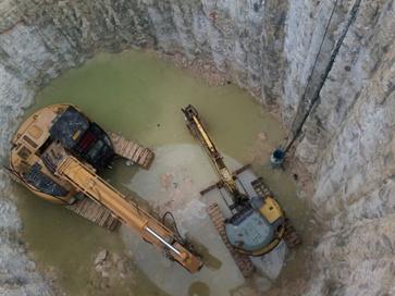 Despite of high water level and congested area we succeeded to  excavate the required depths 40 meter . Cranes used to lower the 20 tons machines